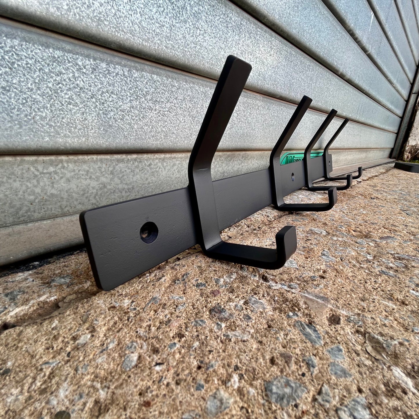 Steel wall mounted coat rail with double hooks